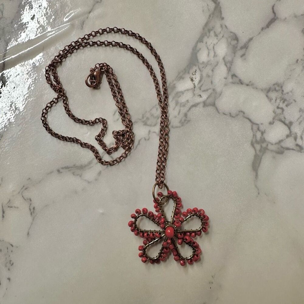 Red beaded flower pendant necklace